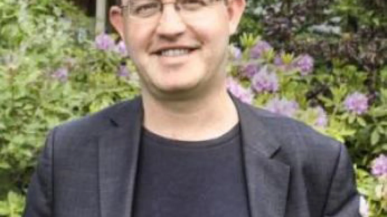 Headshot of keynote speaker Timothy Saunders