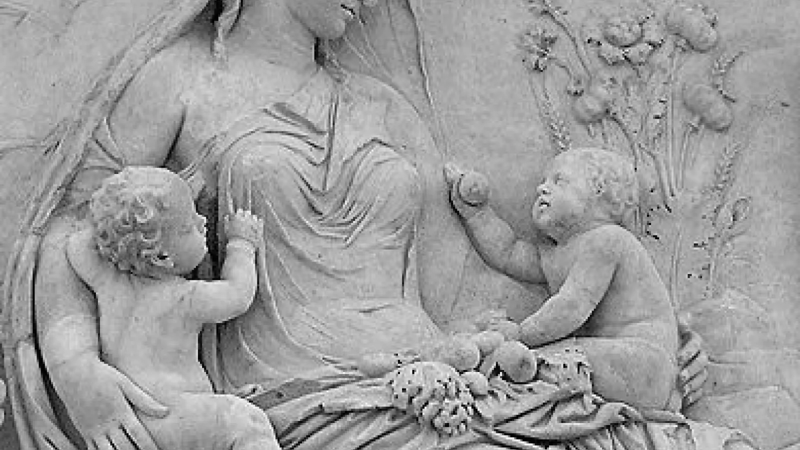 Statue of woman with children.