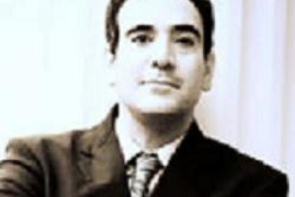Portrait Picture of Aaron Poochigan